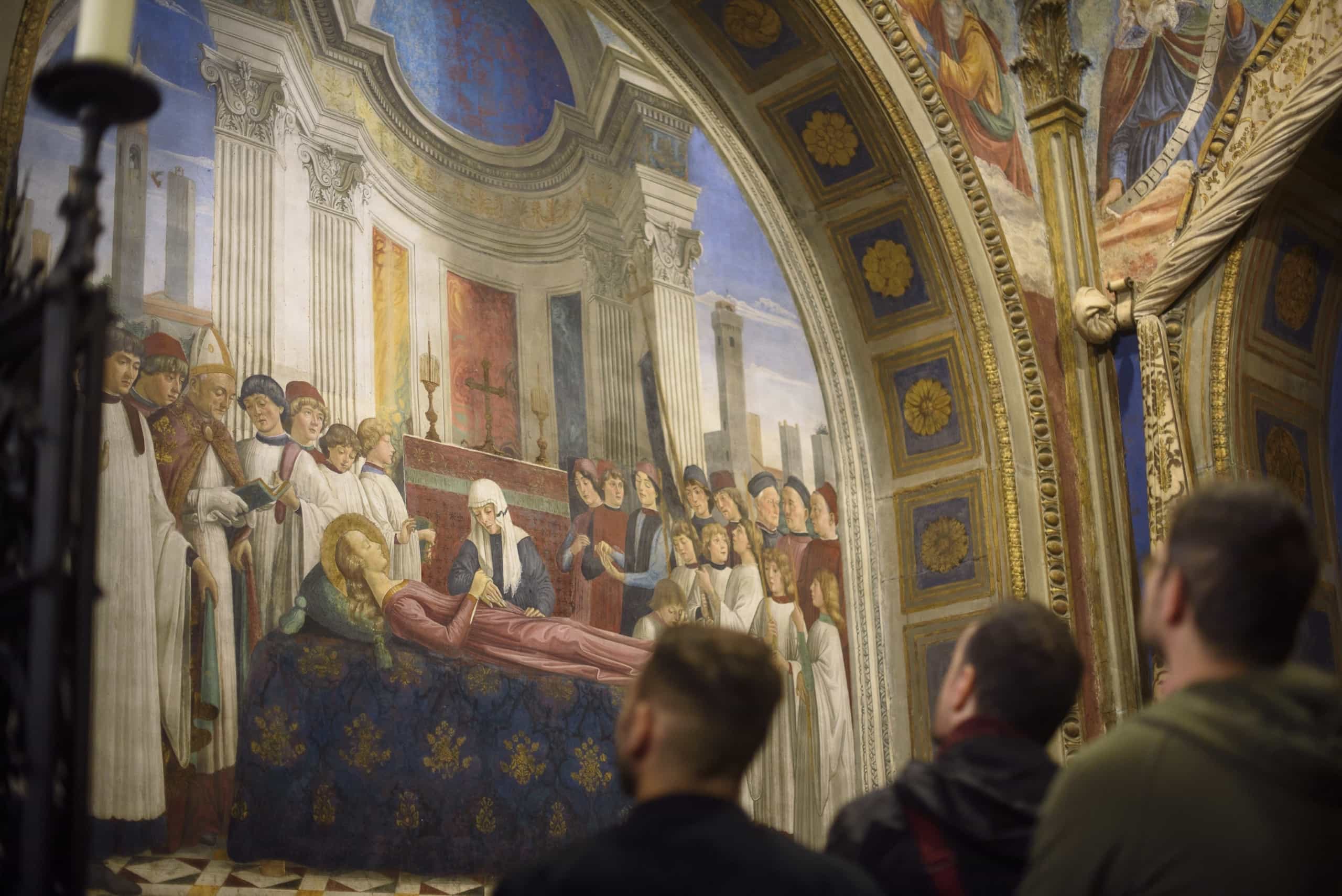 Some members of the Moze team observe a Renaissance fresco depicting the death of the Virgin Mary, with figures in liturgical garments and classical architecture in the background.